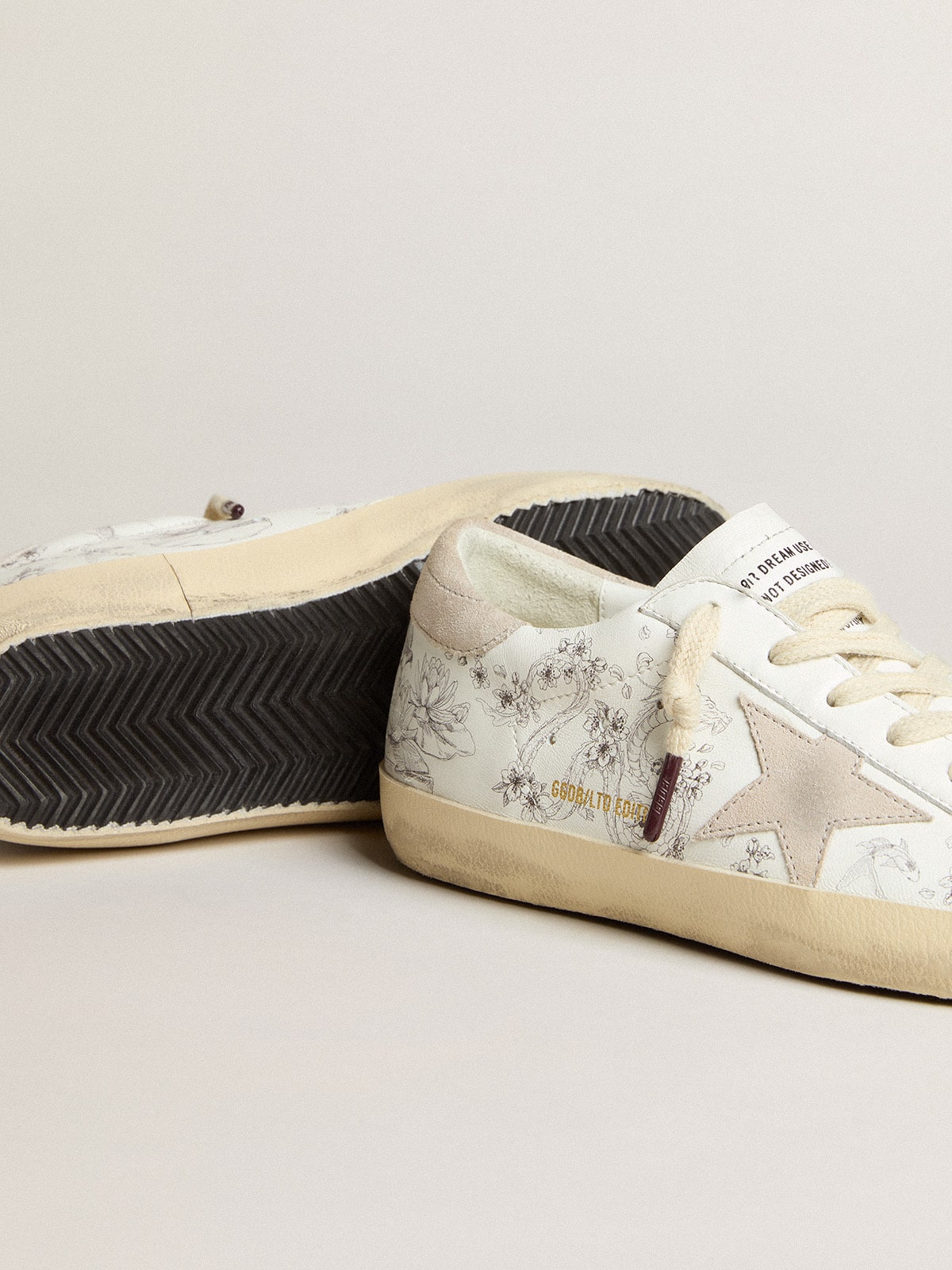 Women's Super-Star LTD CNY in white leather with lettering on the upper