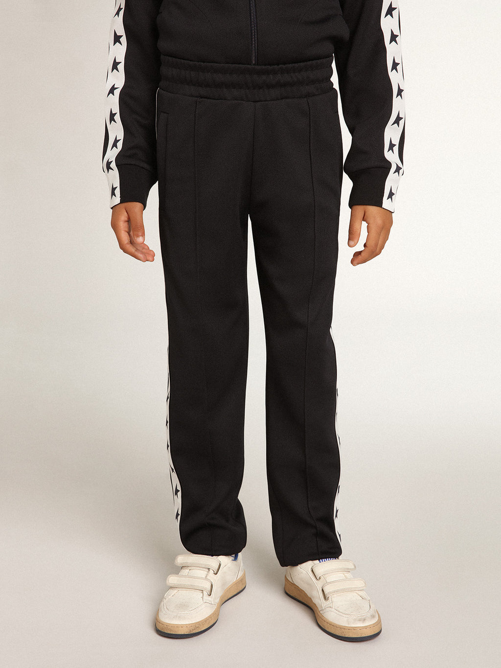 Dark blue joggers with white strip and contrasting stars| Golden Goose