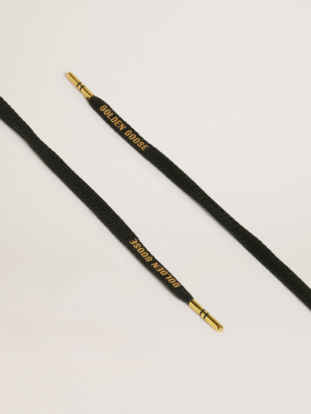 Black cotton laces with contrasting gold-colored logo| Golden Goose