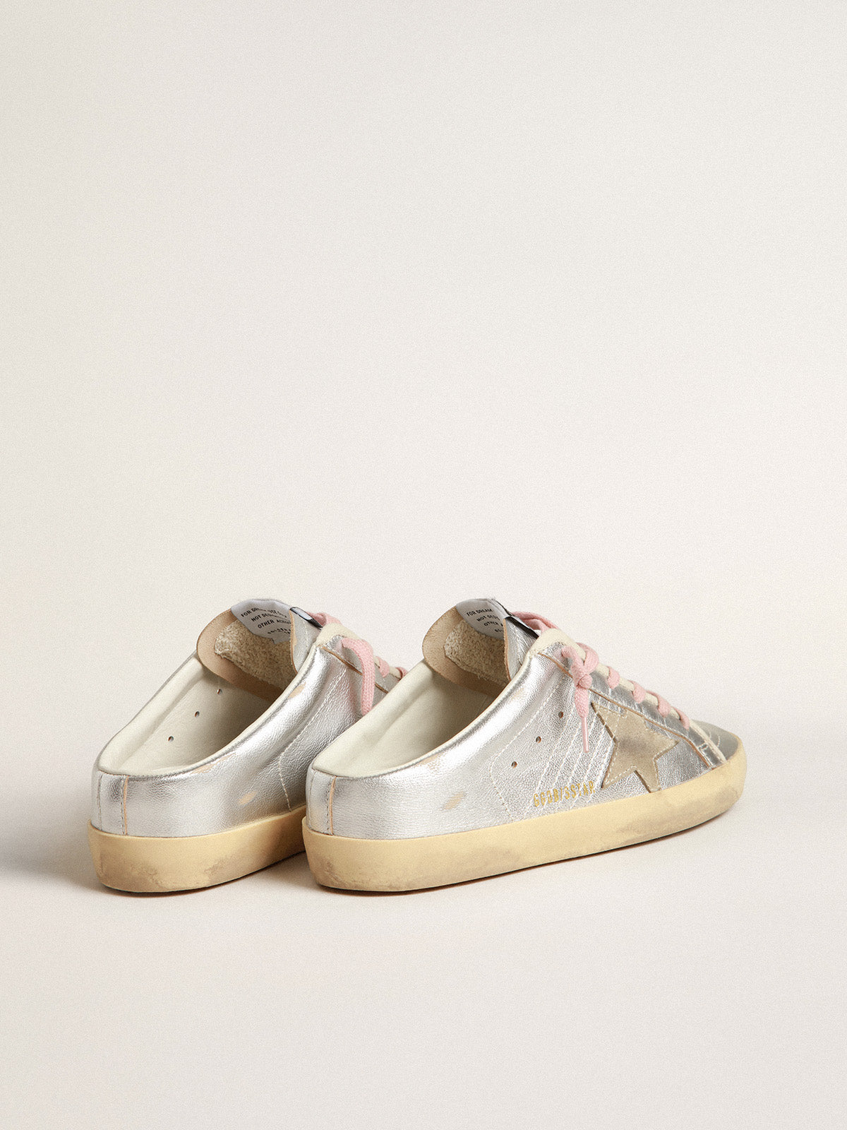 Super-Star Sabots in silver metallic leather with suede star| Golden Goose