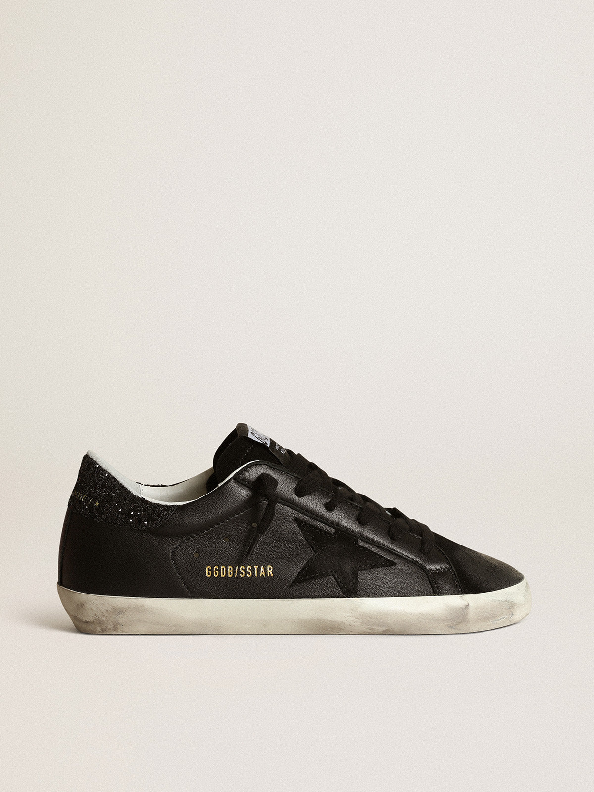 Super-Star in black nappa with black star and glitter heel tab| Golden Goose