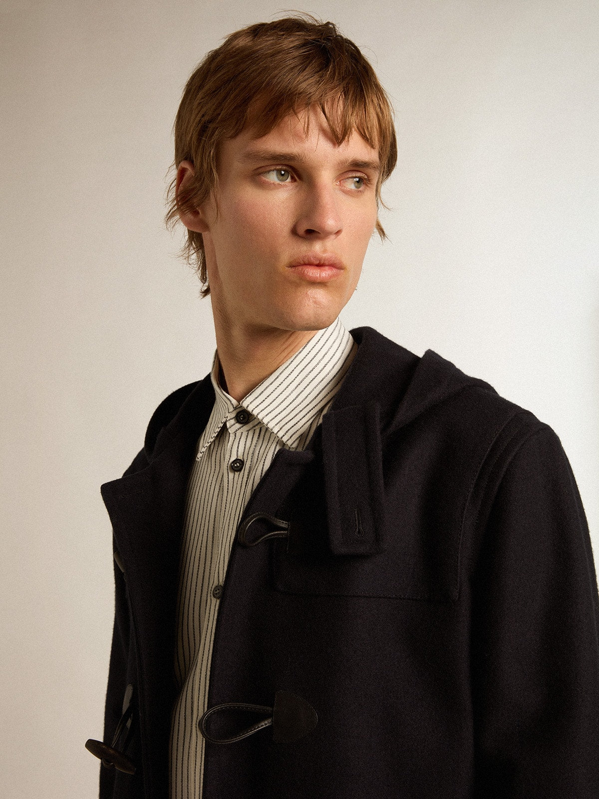 Dark blue wool duffle coat with hood and toggle fastening| Golden Goose