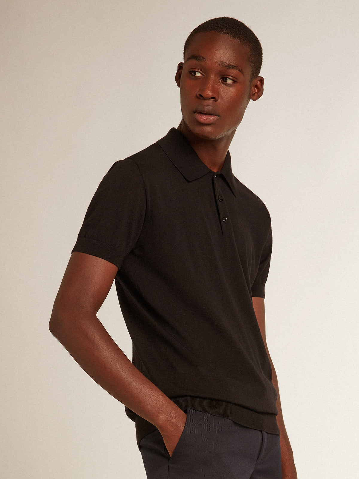Men's short-sleeved polo shirt in black merino wool| Golden Goose