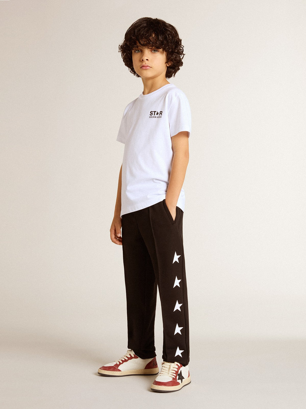 Boys' black joggers with white stars| Golden Goose