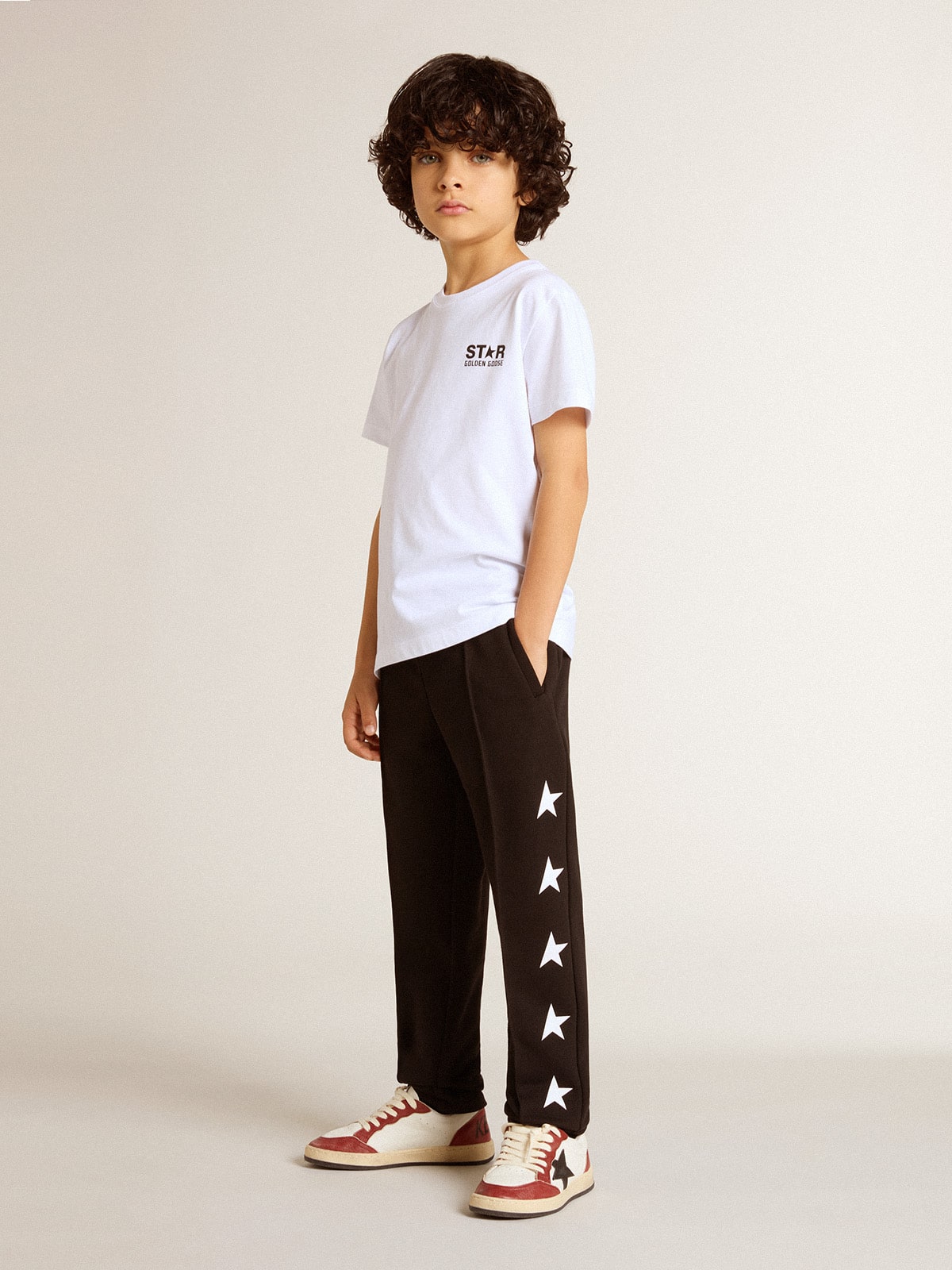 Boys' black joggers with white stars| Golden Goose