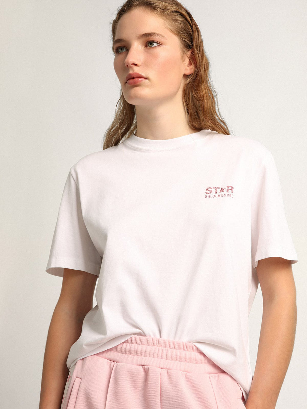 Women's white T-shirt with pink glitter logo and star| Golden Goose