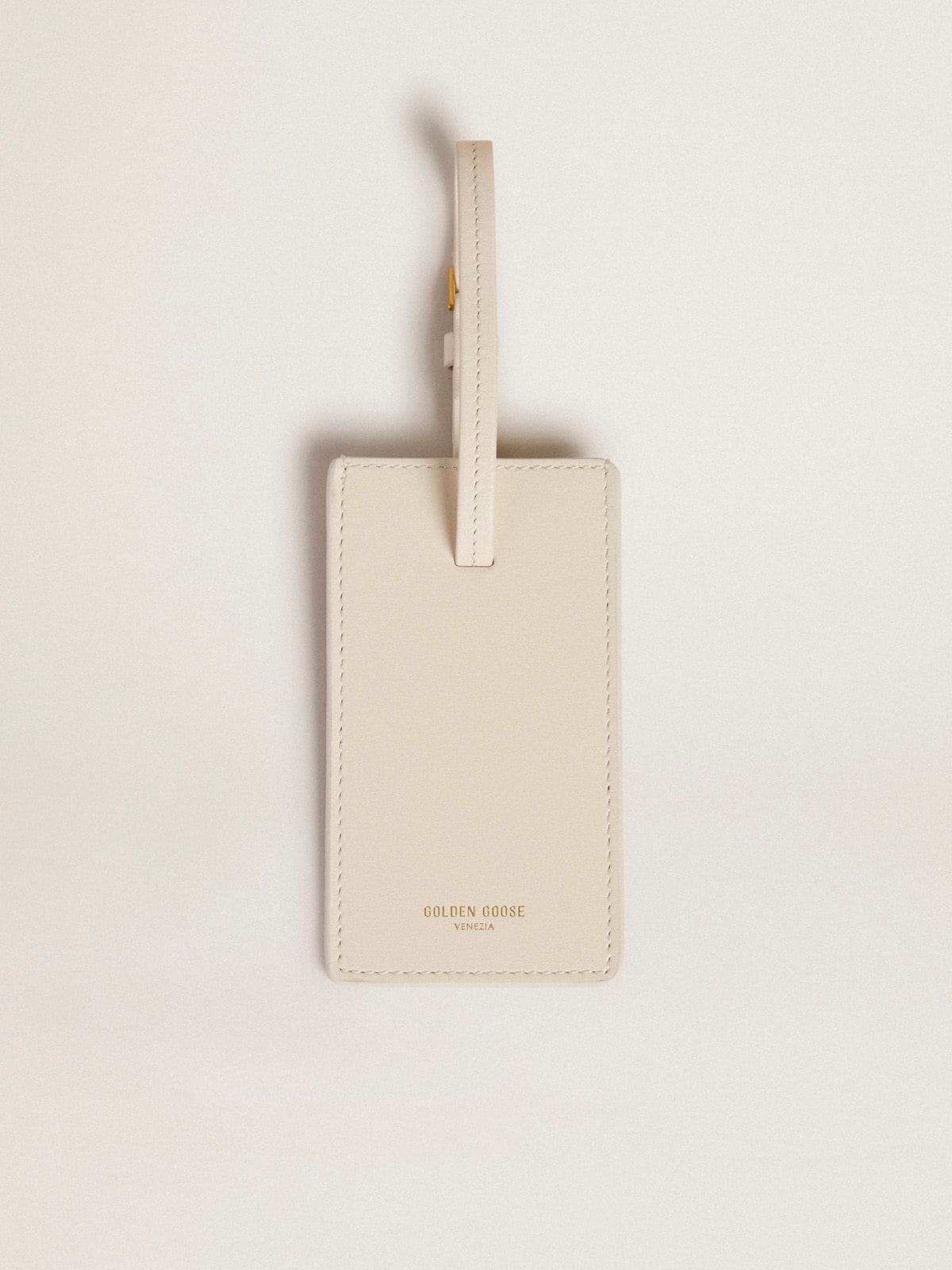 Worn white luggage tag| Golden Goose