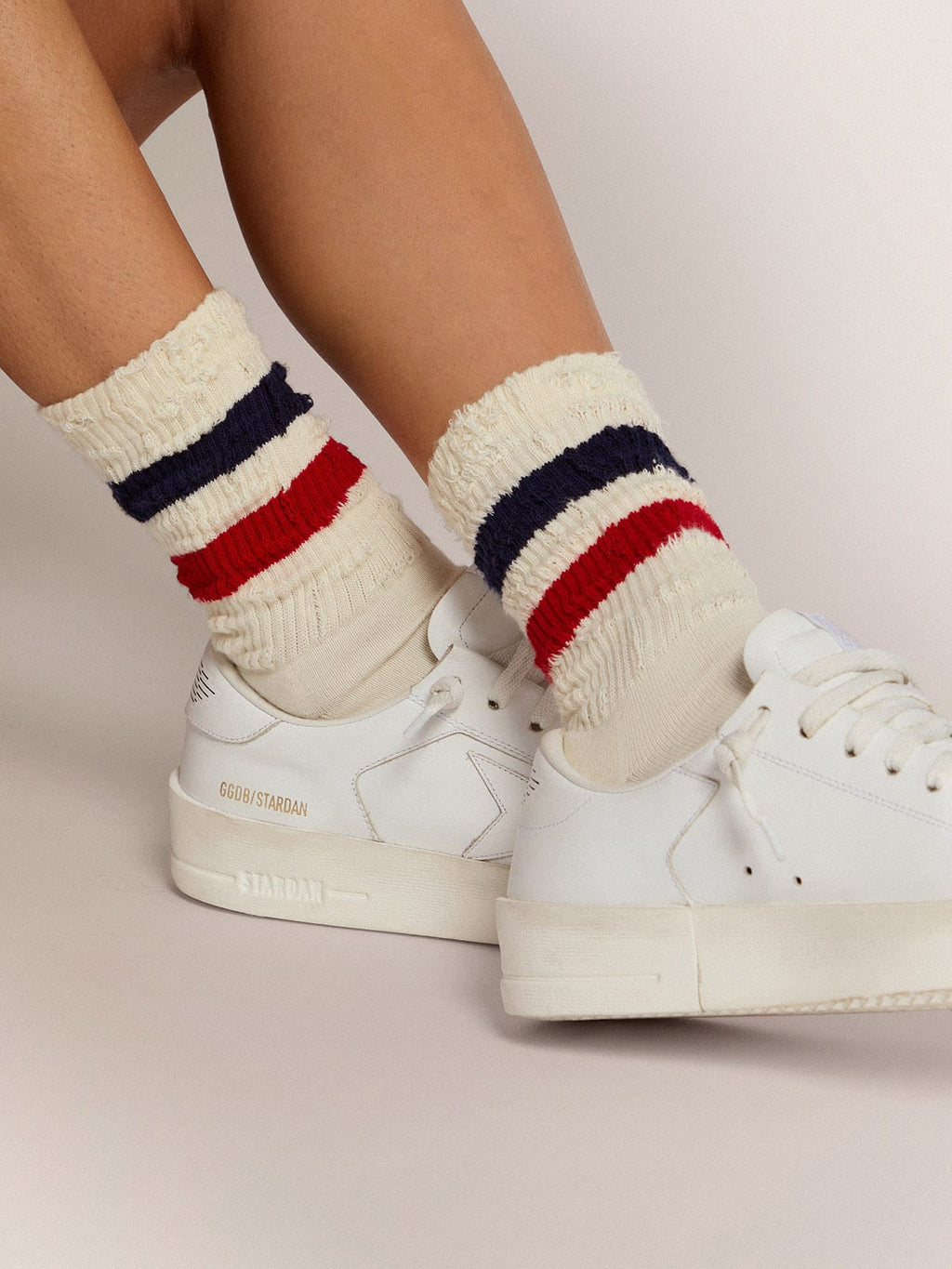 Vintage white socks with distressed details and two-tone stripes| Golden Goose