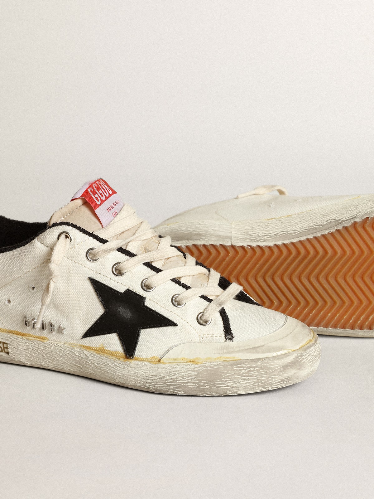 Women's Super-Star LTD in beige canvas with black star| Golden Goose