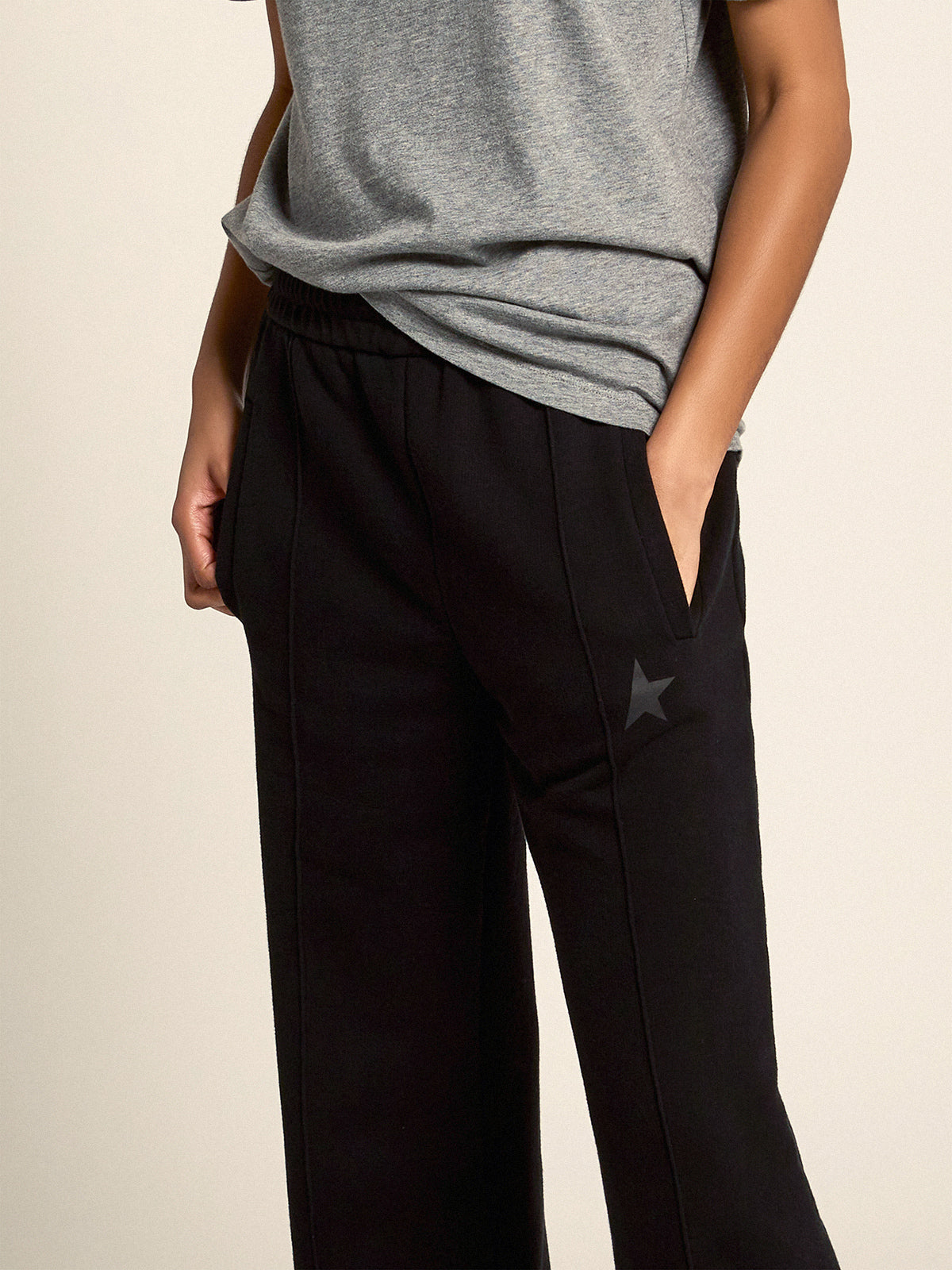 Women's black joggers with star on the front| Golden Goose