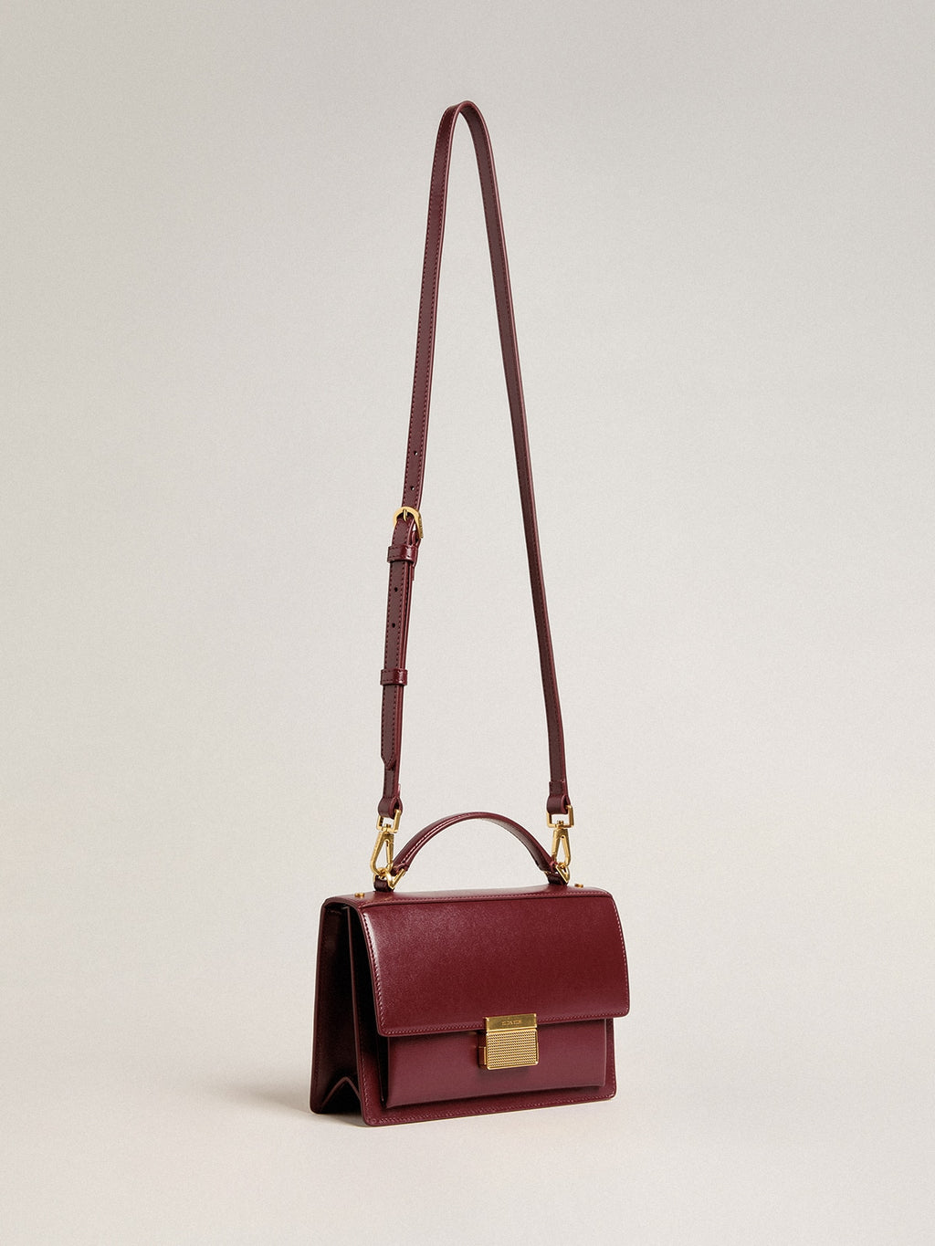 Venezia Bag in burgundy boarded leather with gold details| Golden Goose