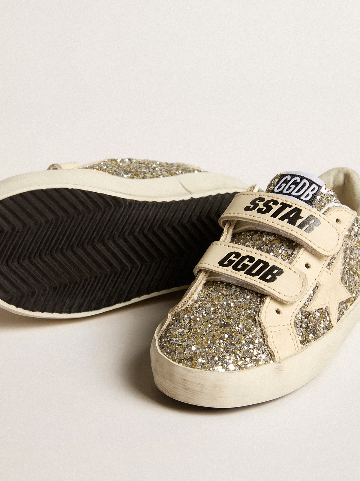 Old School Young in platinum glitter with leather star and heel tab| Golden Goose