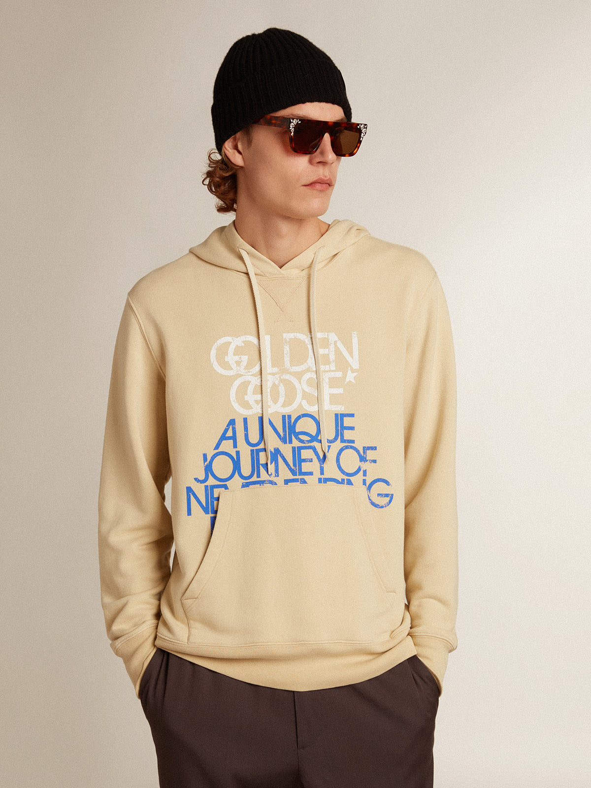 Marzipan-colored sweatshirt with lettering on the front| Golden Goose