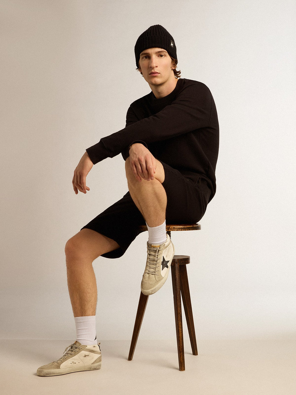 Black Archibald Star Collection sweatshirt with tone-on-tone star on the front| Golden Goose