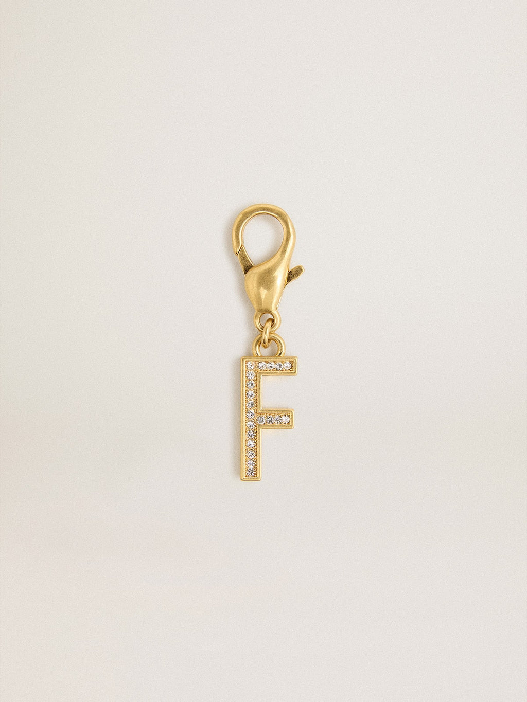 Letter F charm in gold-colored brass with crystals| Golden Goose