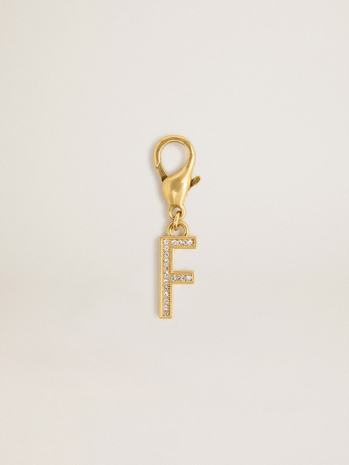 Letter F charm in gold-colored brass with crystals| Golden Goose