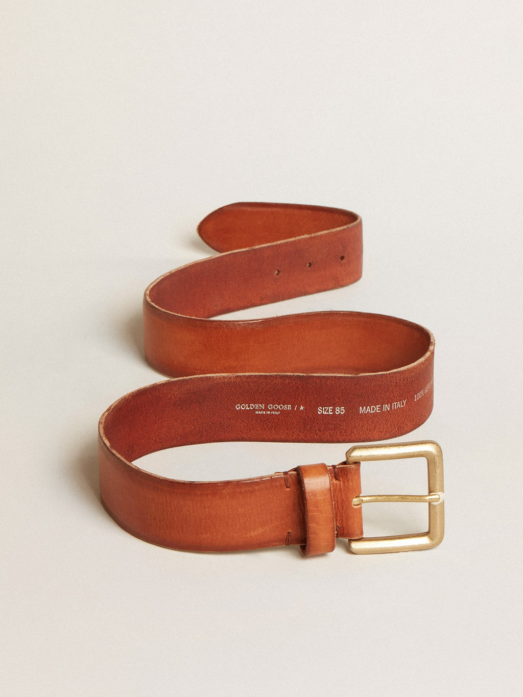 Belt in tan-colored washed leather with raised print| Golden Goose