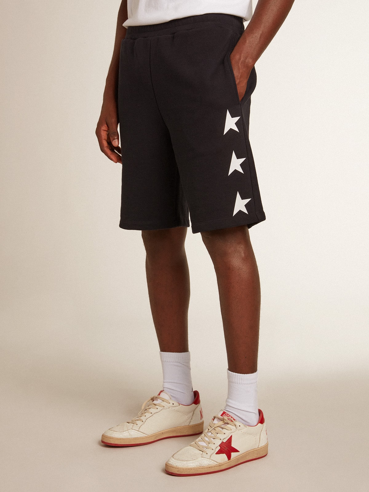 Men's black bermuda shorts with white stars| Golden Goose