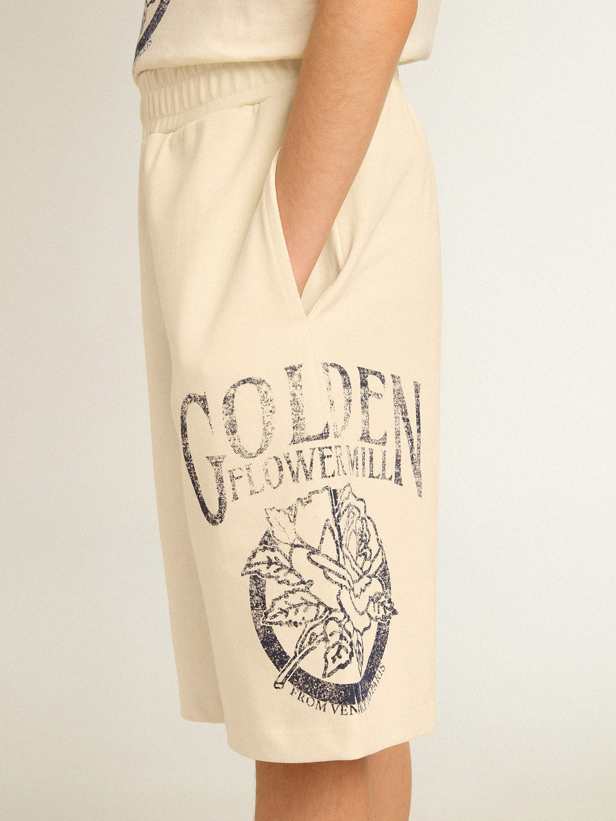 Boys' Bermuda shorts in aged white with print on the front| Golden Goose