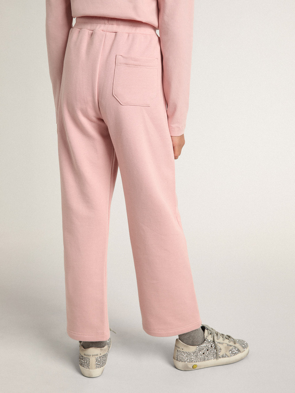 Pink joggers with glitter star on the front| Golden Goose