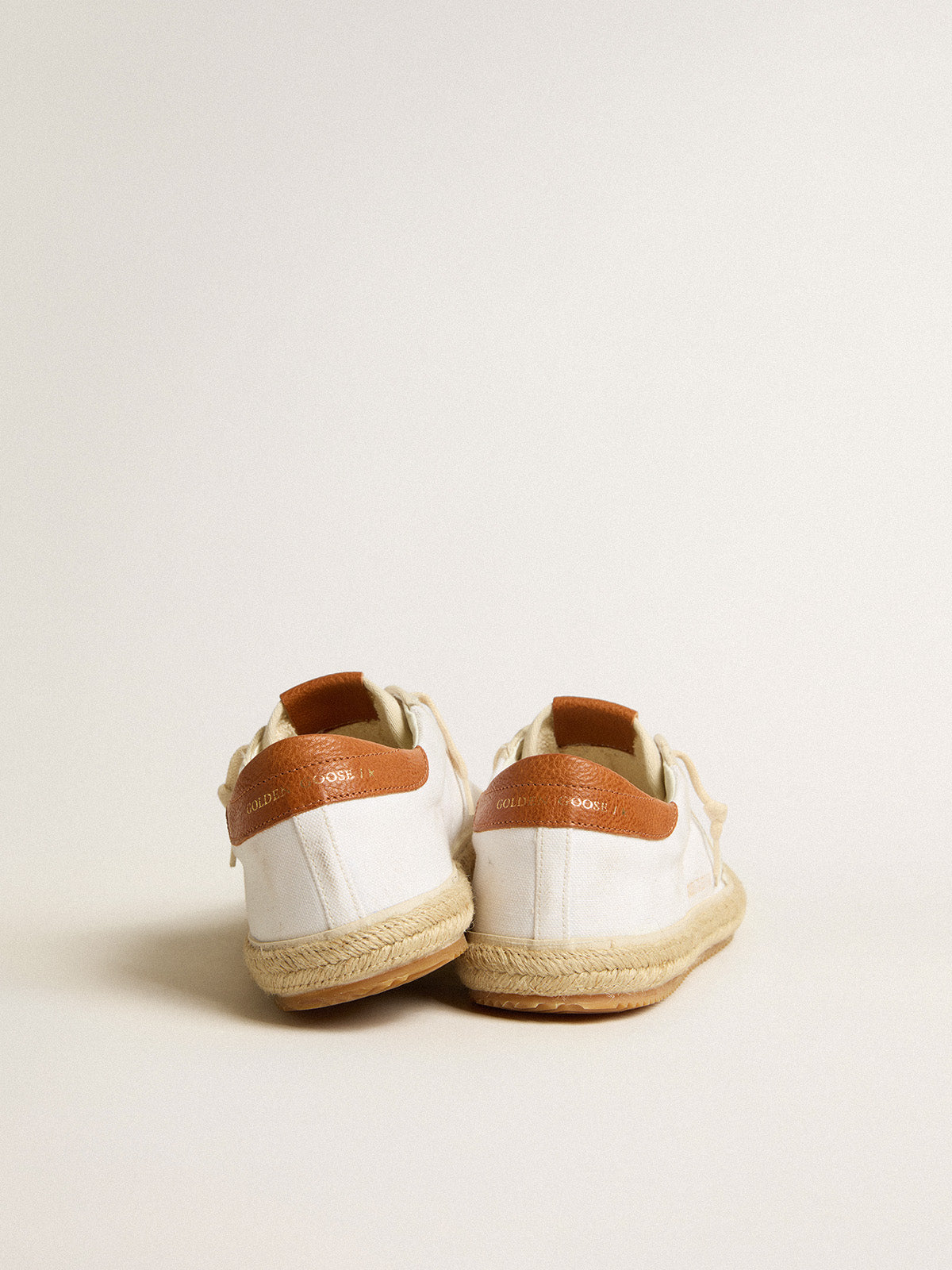 Women's Super-Star LTD in canvas with white leather star and raffia toe| Golden Goose