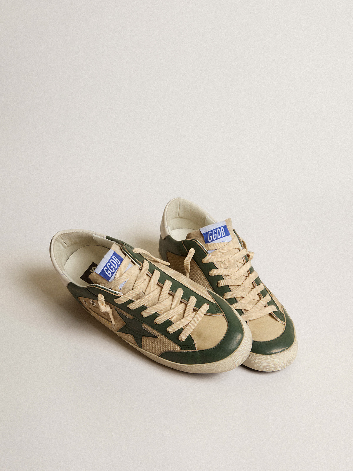 Super-Star LTD in cream mesh and green nappa with nappa star| Golden Goose