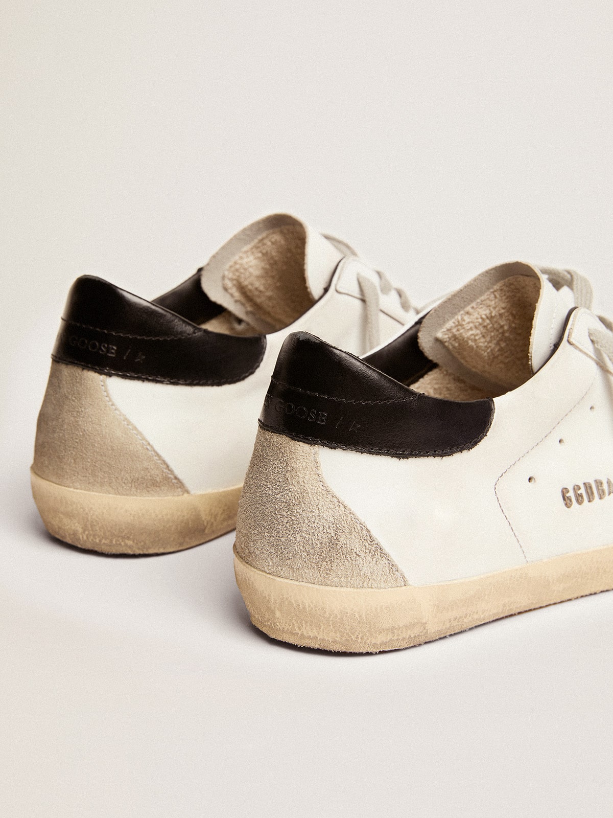 Men's Super-Star with black heel tab and metal stud lettering| Golden Goose