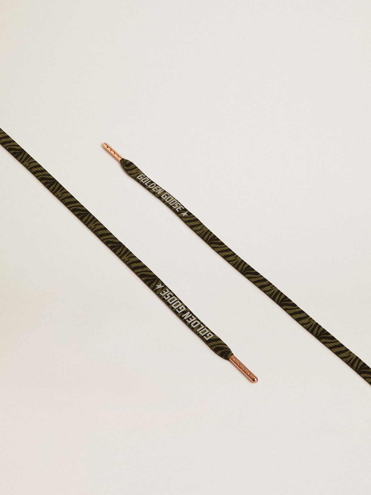 Green and black zebra-print laces with contrasting silver-colored logo| Golden Goose
