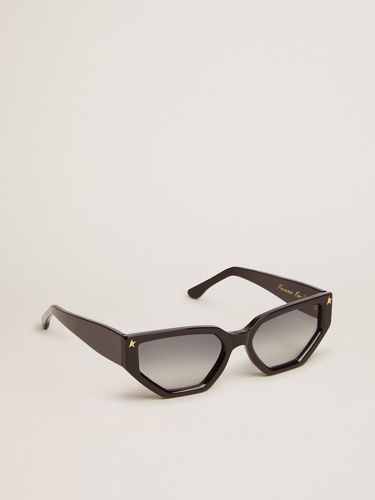 Rectangular-style Sunframe Jackie with black frame and gold details| Golden Goose