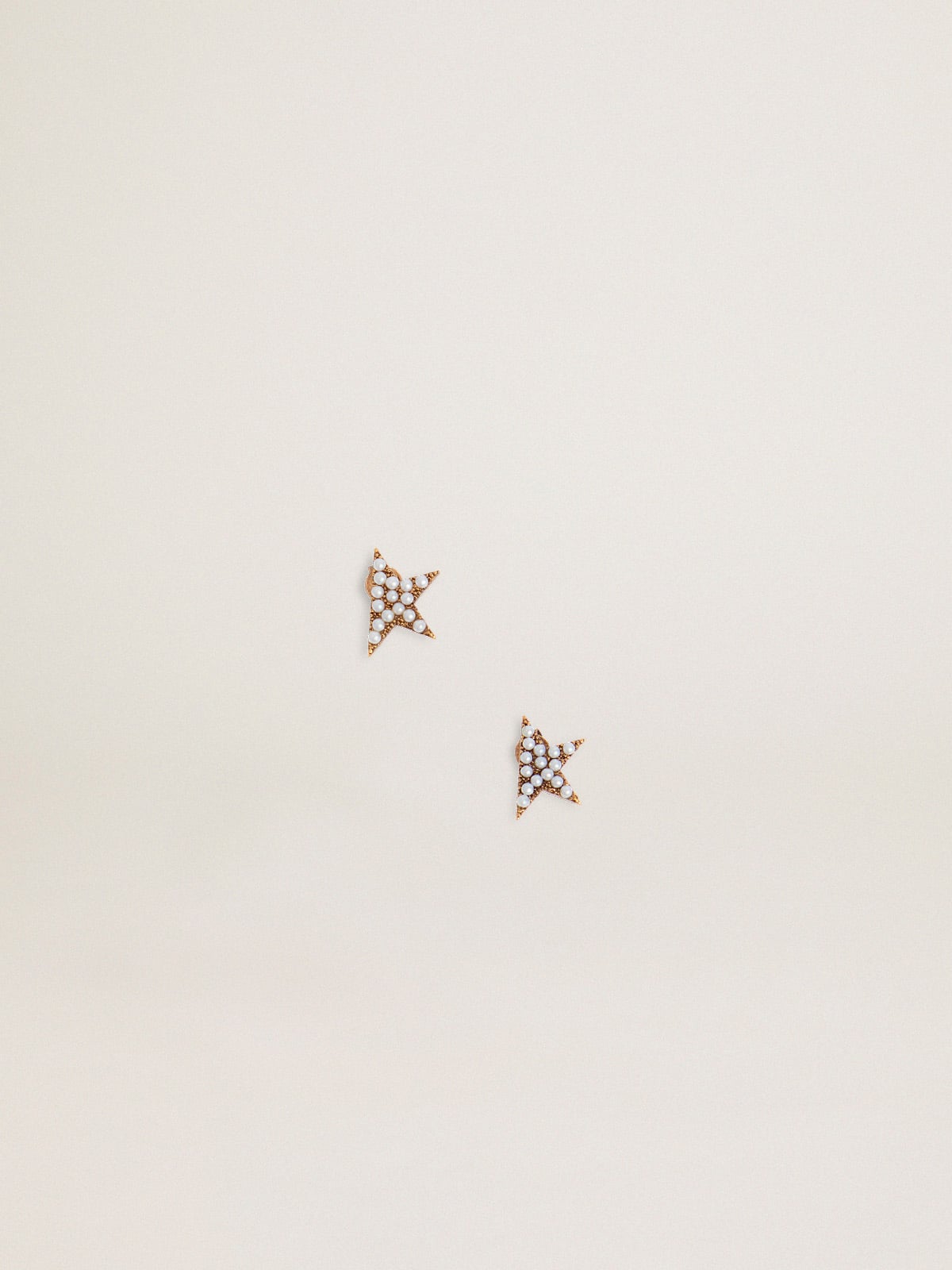 Women's stud earrings in antique gold color with decorative beads| Golden Goose