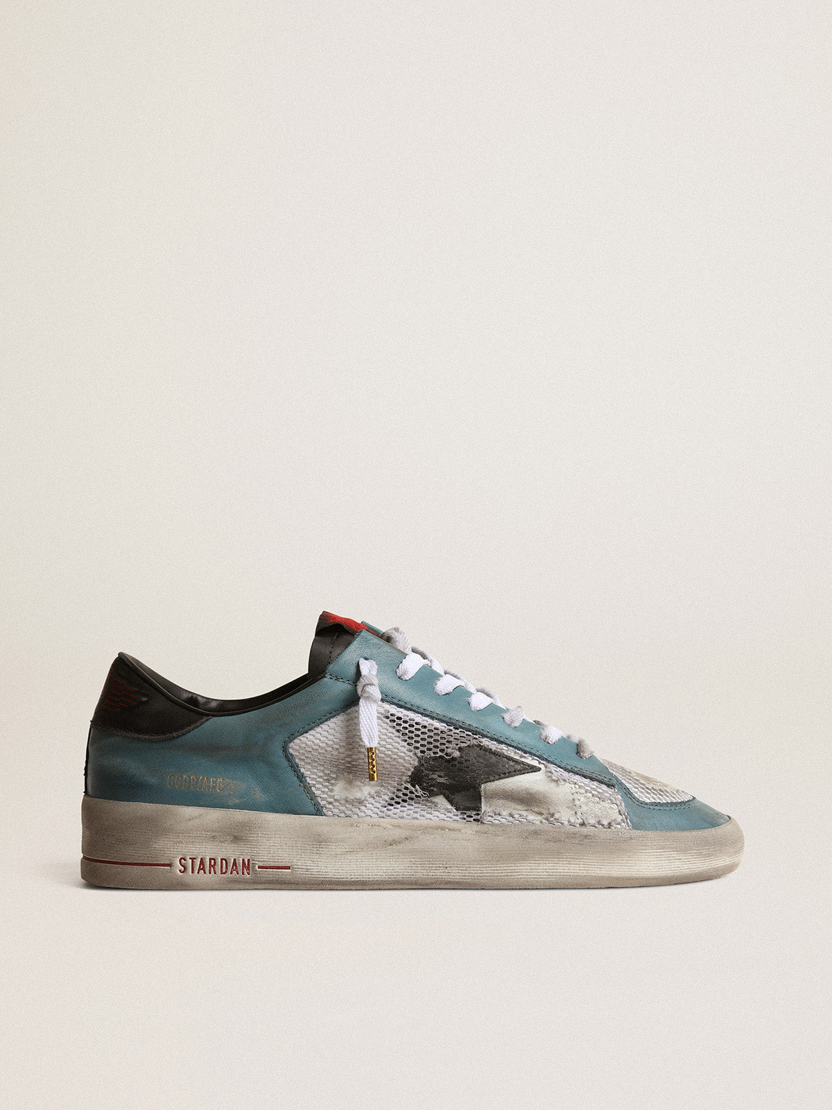 Men's Stardan in distressed mesh and petrol-colored upper| Golden Goose