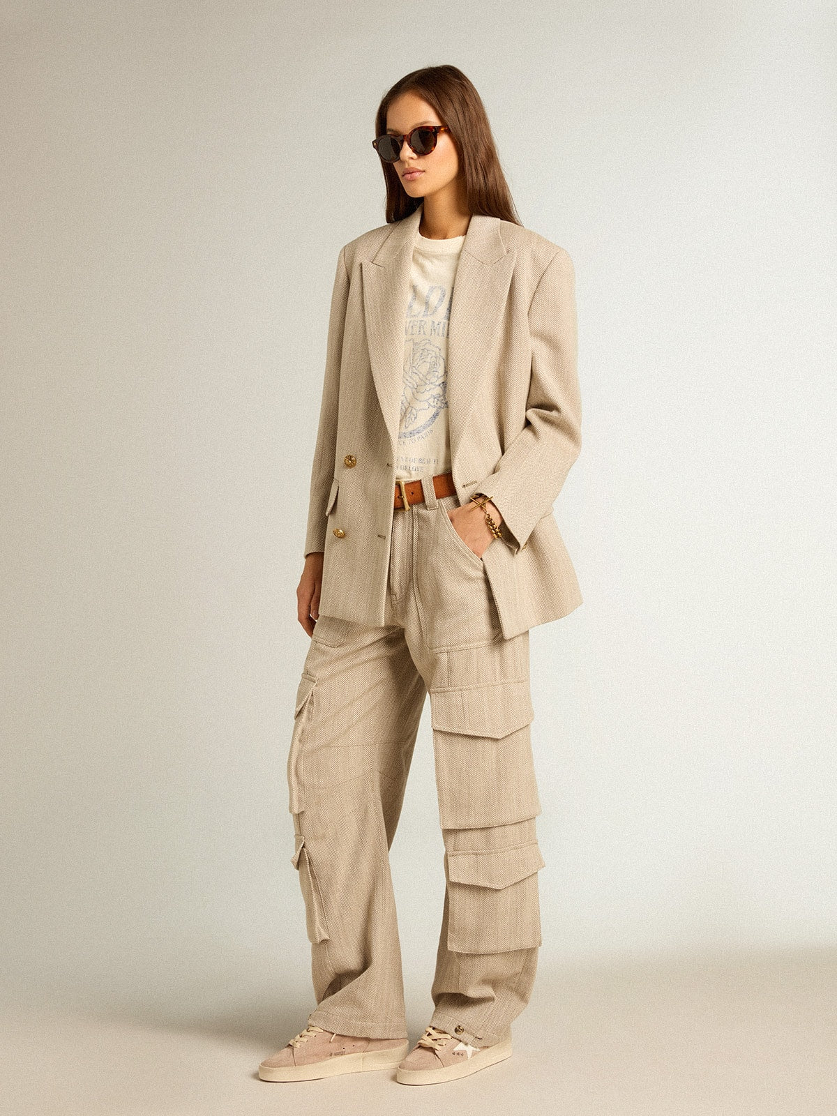 Women's dark olive-colored cotton cargo pants with a herringbone design