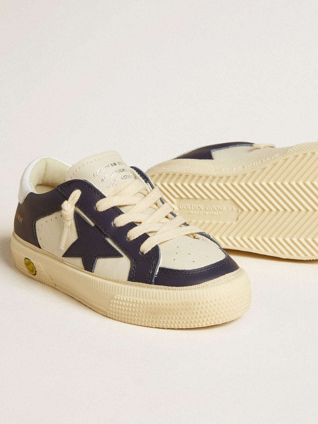 May Young in white and blue leather with leather star and heel tab| Golden Goose