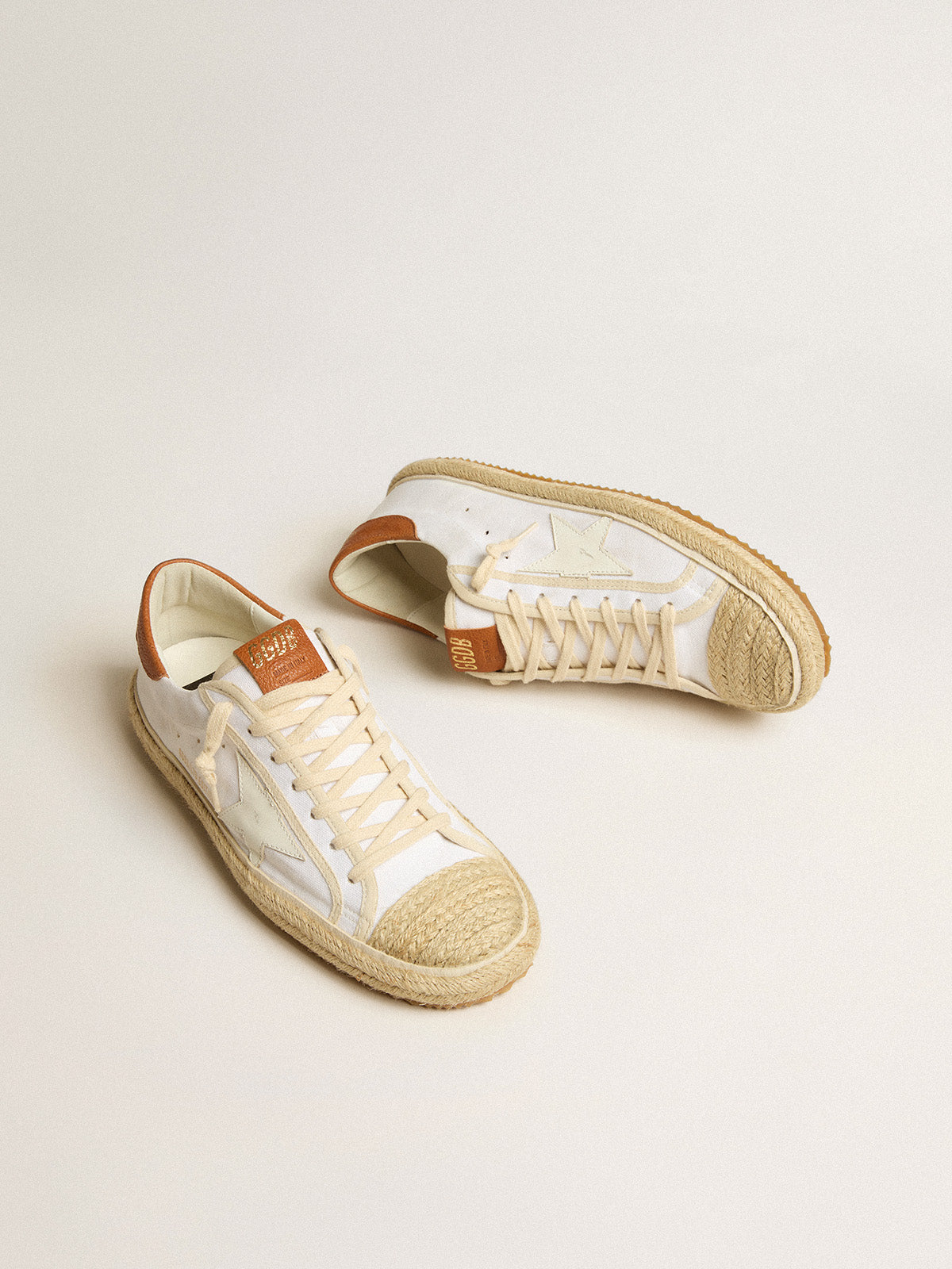 Women's Super-Star LTD in canvas with white leather star and raffia toe| Golden Goose