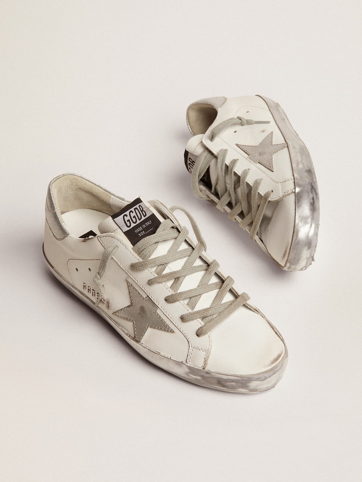 Women's Super-Star with silver sparkle foxing and metal stud lettering| Golden Goose
