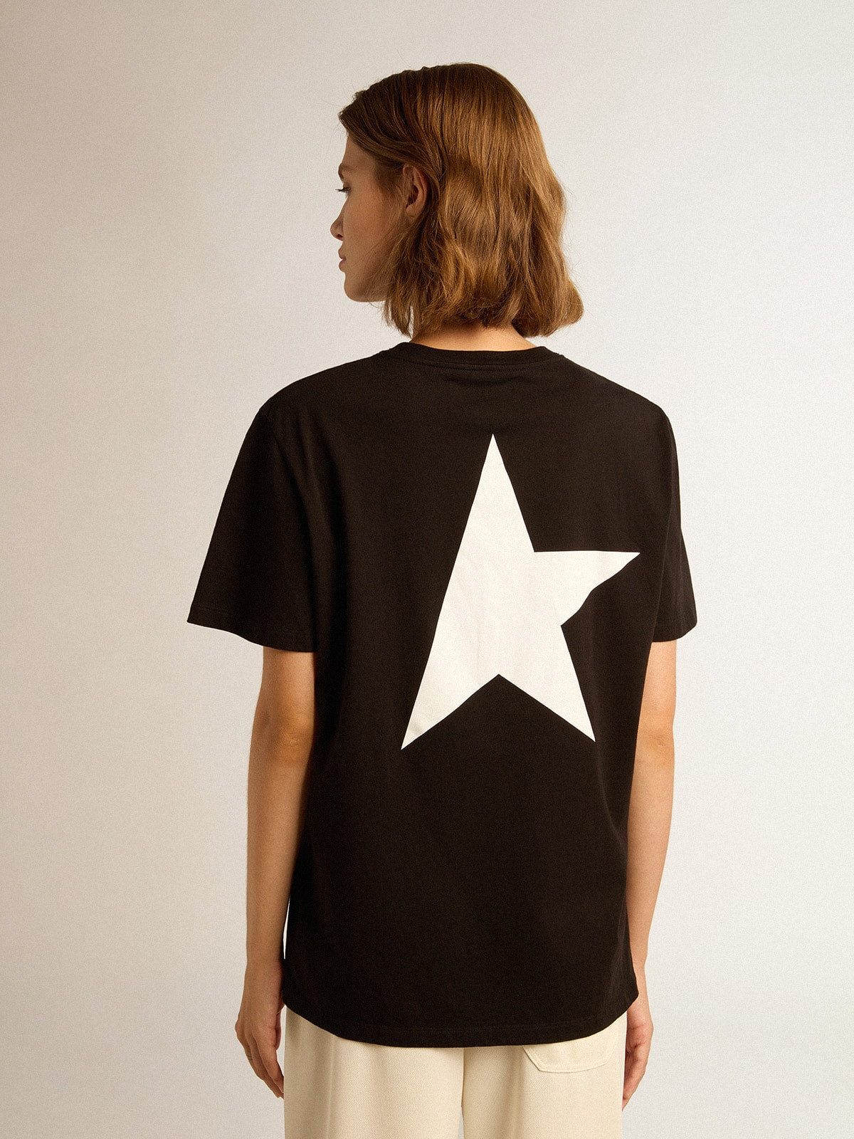 Black Star Collection T-shirt with contrasting white logo and star| Golden Goose