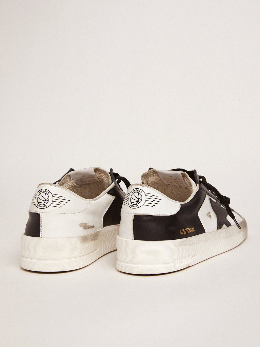 Women's Stardan sneakers in black and white leather| Golden Goose