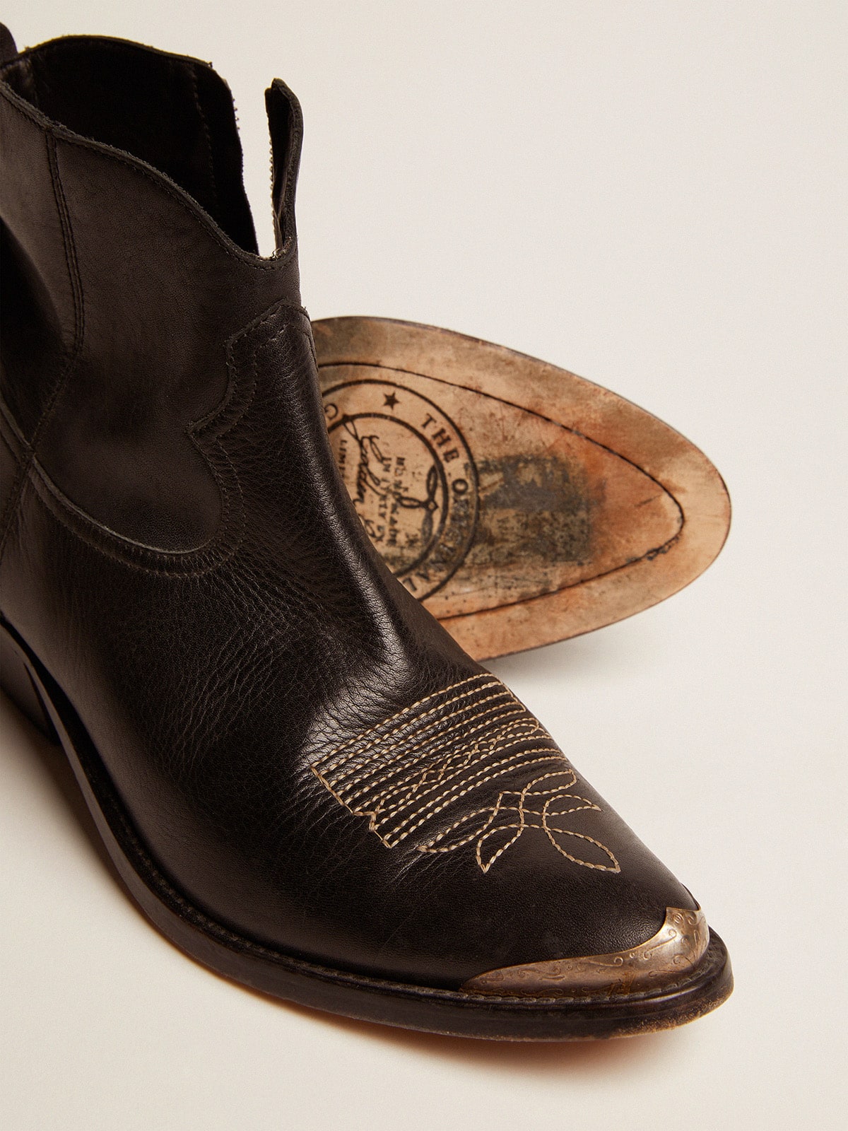 Young ankle boots in black leather with sand-colored embroidery| Golden Goose