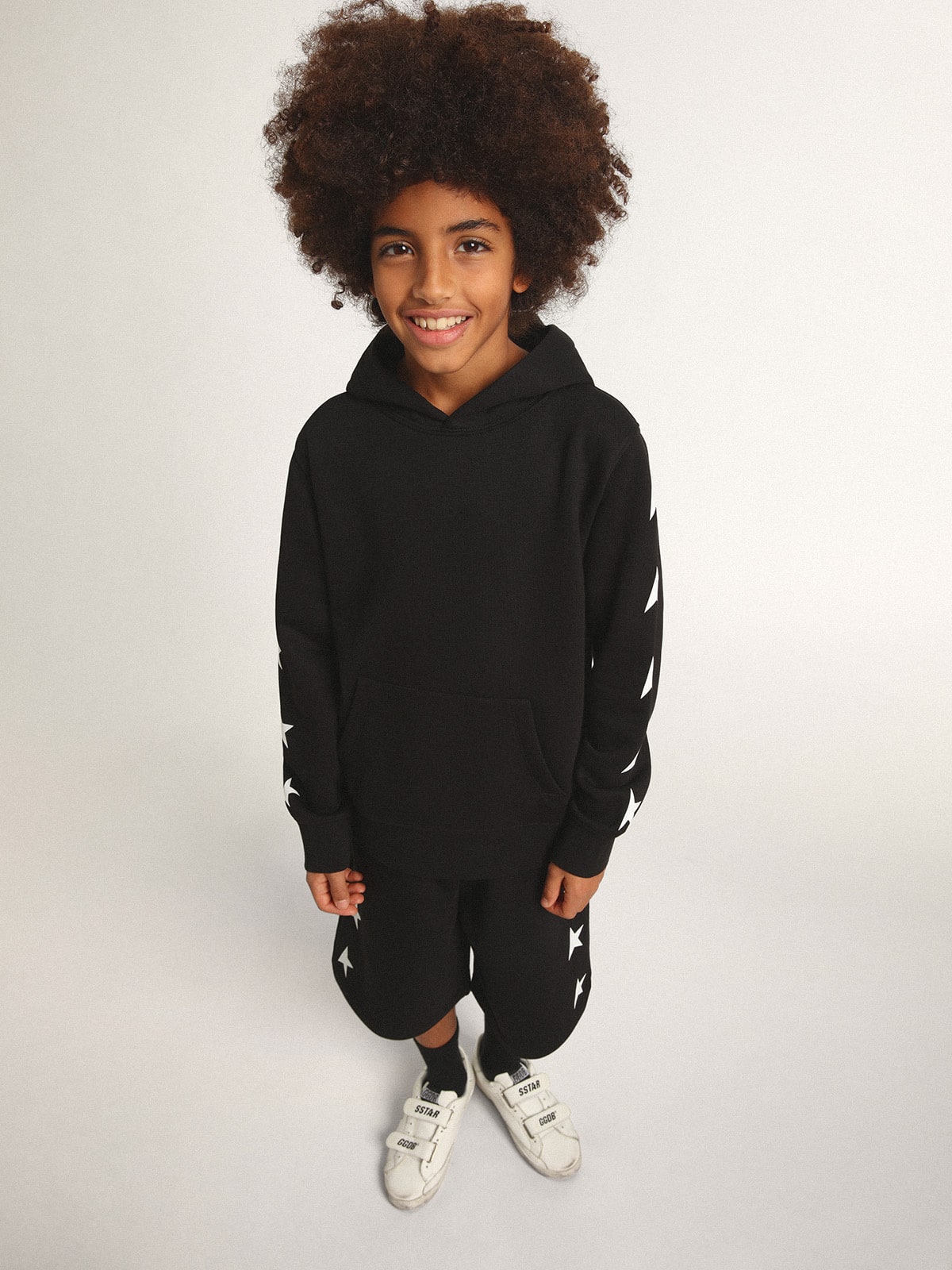 Boys' hooded sweatshirt in black with contrasting white stars| Golden Goose