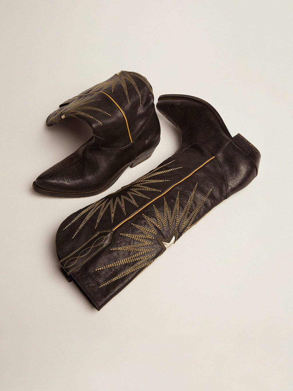 Wish Star boots in black leather with platinum laminated leather inlay star| Golden Goose