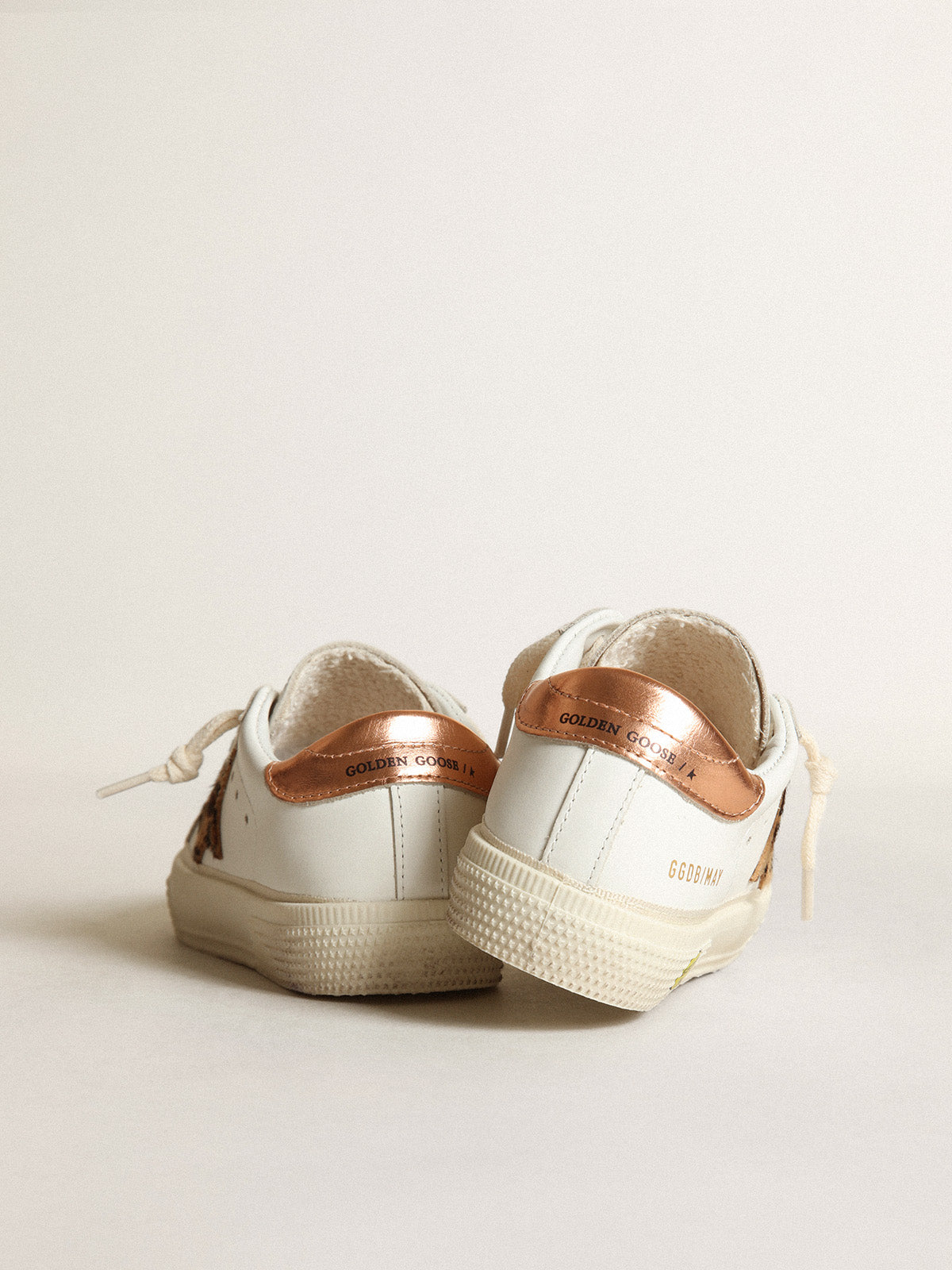 Young May with leopard print pony skin star and copper-colored heel| Golden Goose