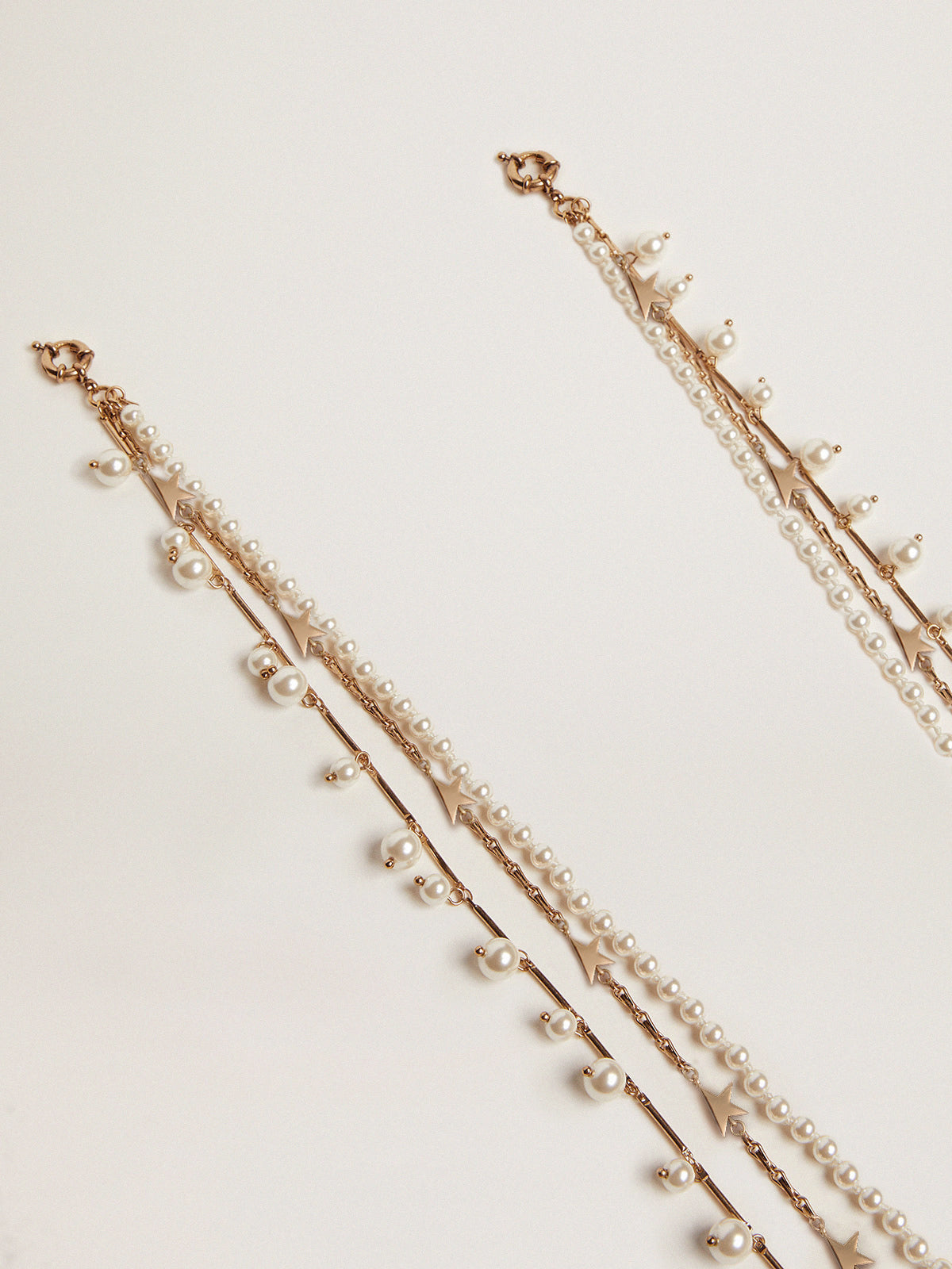 Women's necklace with four antique gold-colored heritage chains| Golden Goose