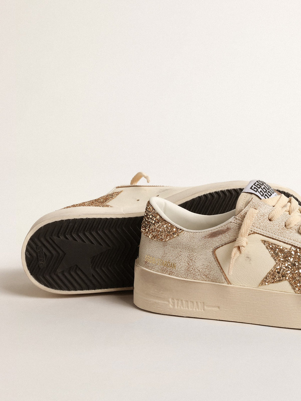 Women's Stardan in ecru nappa leather with gold glitter star and heel tab| Golden Goose