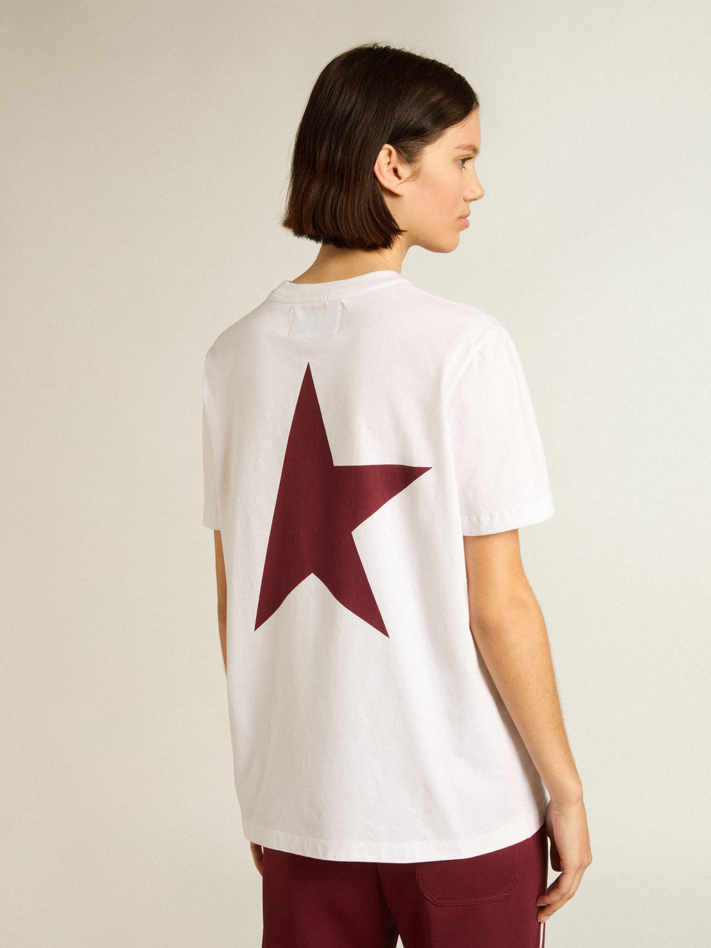 Women's white T-shirt with burgundy star on the front| Golden Goose