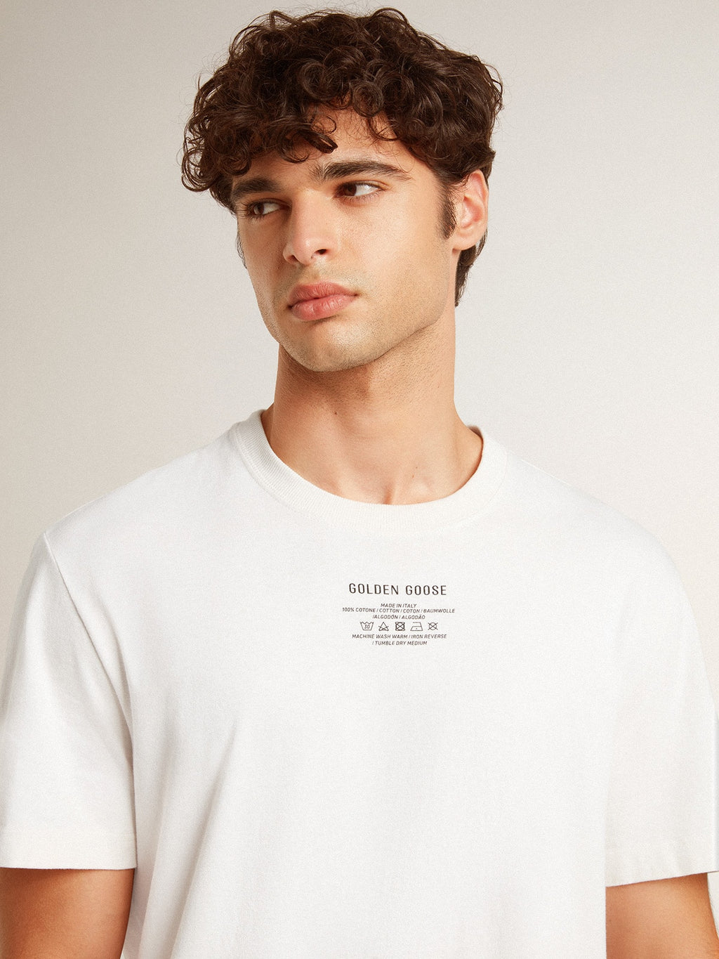 Men's worn-white cotton T-shirt with black lettering| Golden Goose