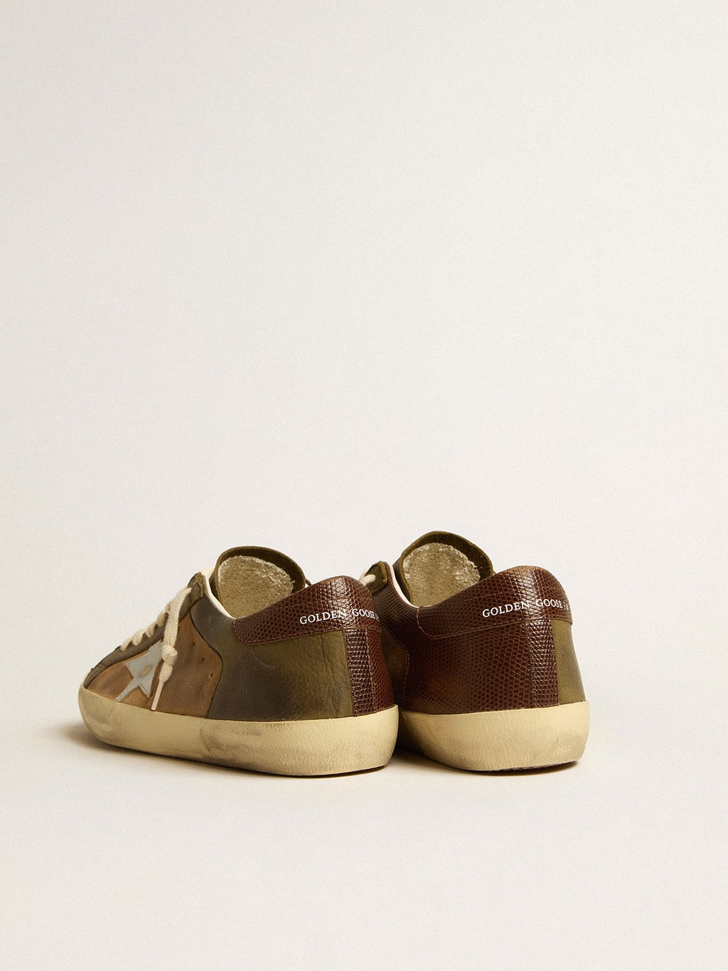 Super-Star LTD in green leather and tobacco-colored suede with silver star| Golden Goose