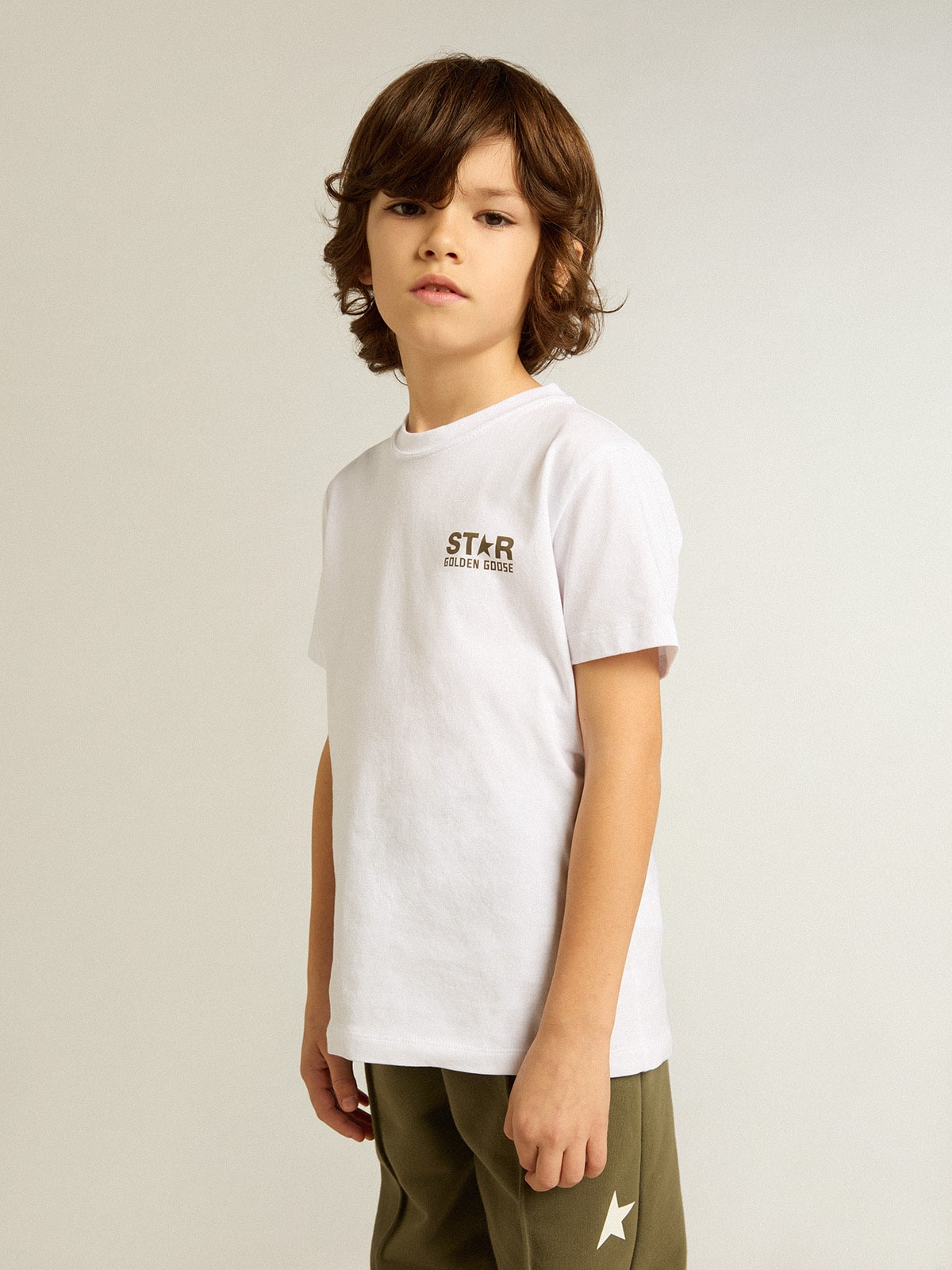 Boys' white T-shirt with contrasting dark green logo and star| Golden Goose
