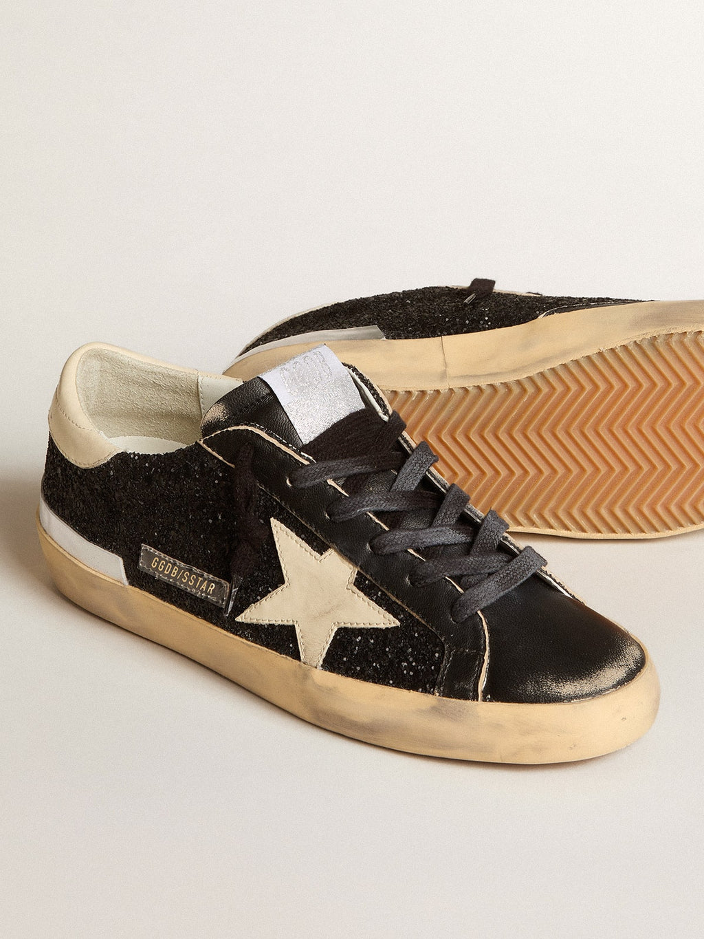 Super-Star in black glitter and nappa with cream leather star and heel tab| Golden Goose