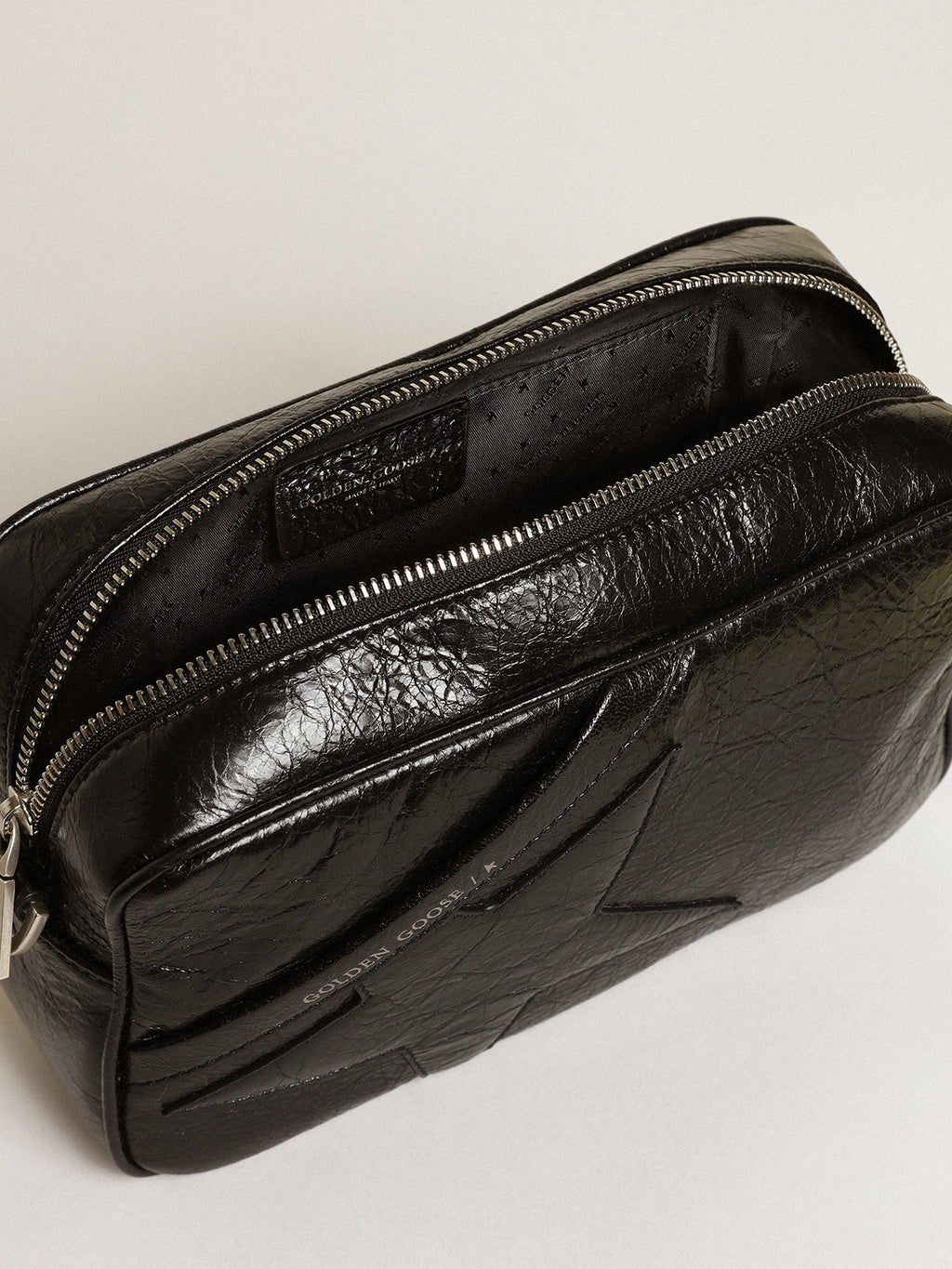 Women's Star Bag in glossy black leather with tone-on-tone star| Golden Goose