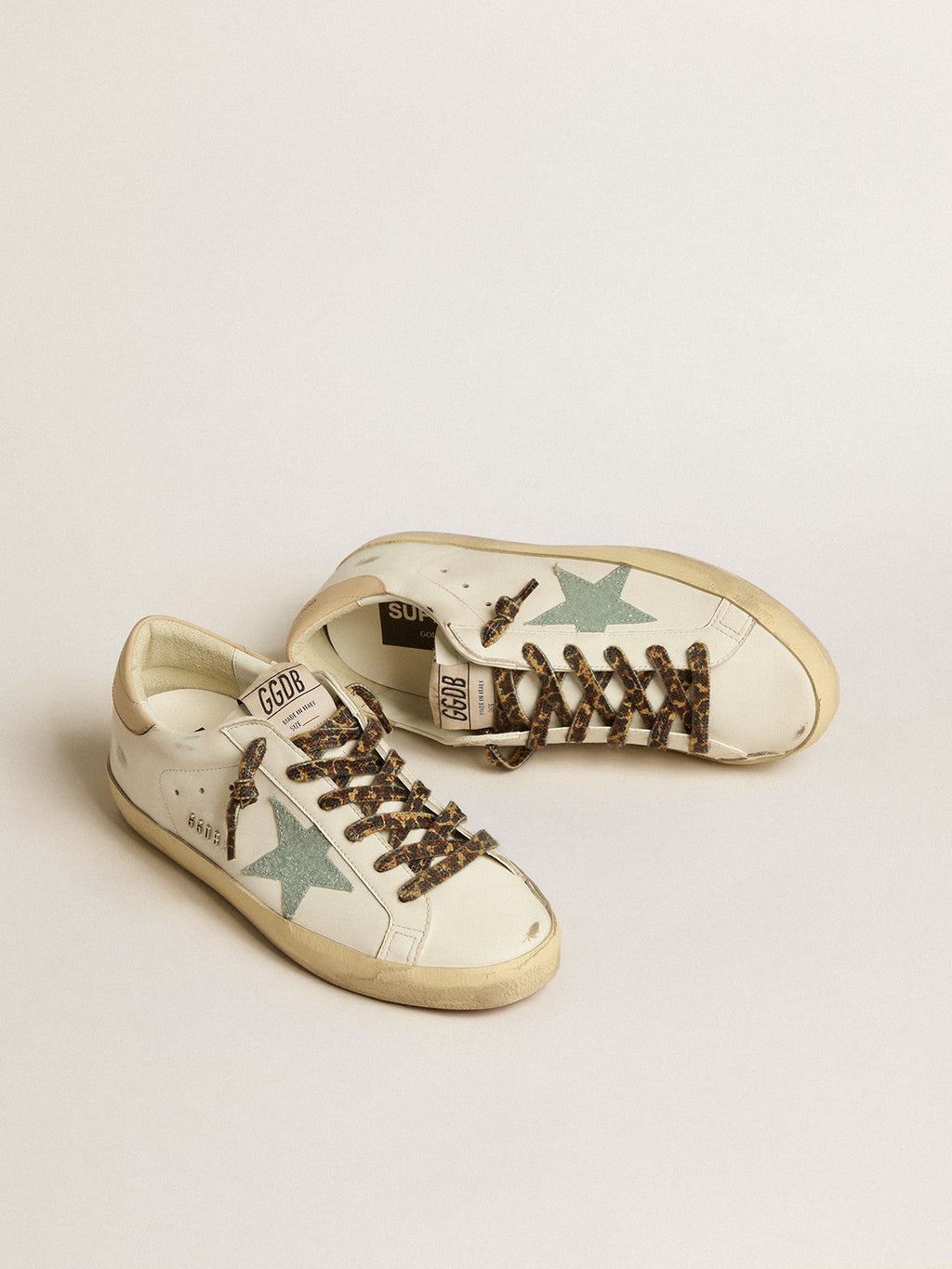 Super-Star with gray glitter star and nude leather heel tab| Golden Goose